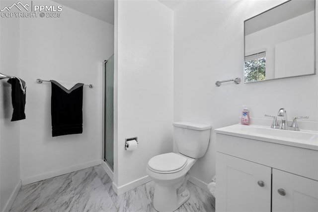 1540 Shasta Dr, Colorado Springs, CO 80910 - full bath with baseboards, marble finish flooring, a shower stall, vanity, and toilet