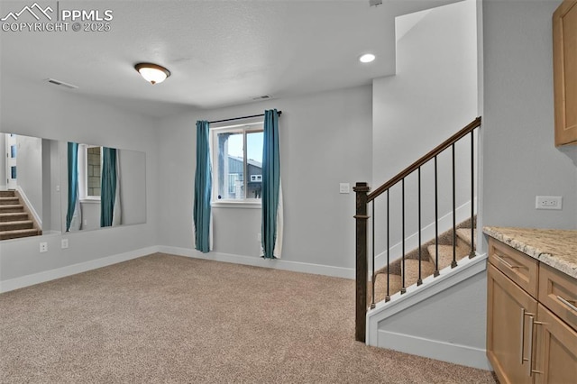 interior space with recessed lighting, stairway, visible vents, and carpet floors