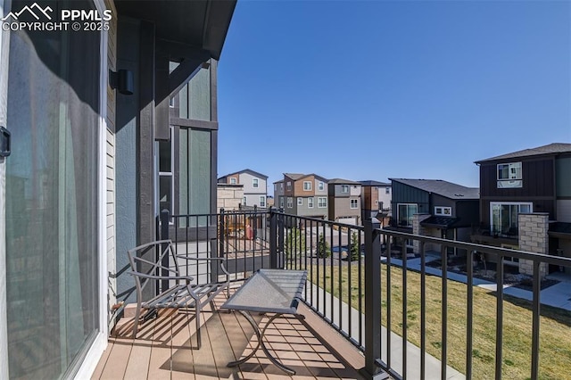 balcony featuring a residential view