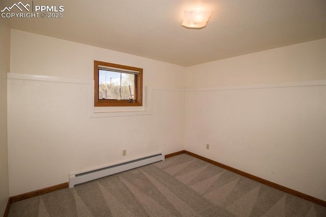 2324 W Willamette Ave, Colorado Springs, CO 80904 - carpeted empty room with a baseboard heating unit and baseboards