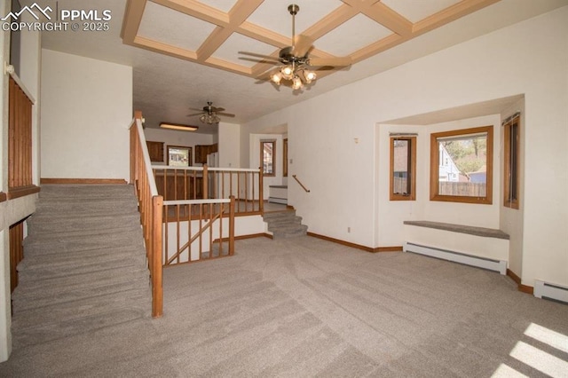 2324 W Willamette Ave, Colorado Springs, CO 80904 - unfurnished living room with baseboard heating, coffered ceiling, carpet flooring, baseboards, and stairway
