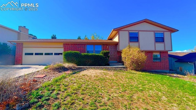 5125 Thistle Ct, Colorado Springs, CO 80917 - view of front facade with brick siding, an attached garage, concrete driveway, and a front lawn