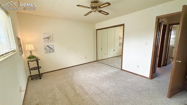 5125 Thistle Ct, Colorado Springs, CO 80917 - unfurnished bedroom featuring carpet floors, a closet, baseboards, and ceiling fan
