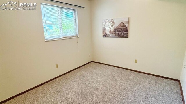 5125 Thistle Ct, Colorado Springs, CO 80917 - unfurnished room featuring light carpet and baseboards