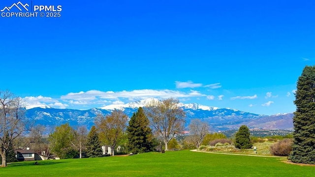 5125 Thistle Ct, Colorado Springs, CO 80917 - view of community with a mountain view and a lawn