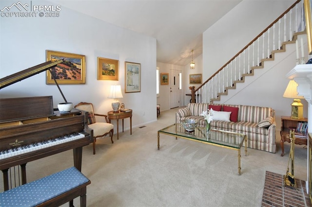 living room featuring baseboards, carpet flooring, vaulted ceiling, and stairway