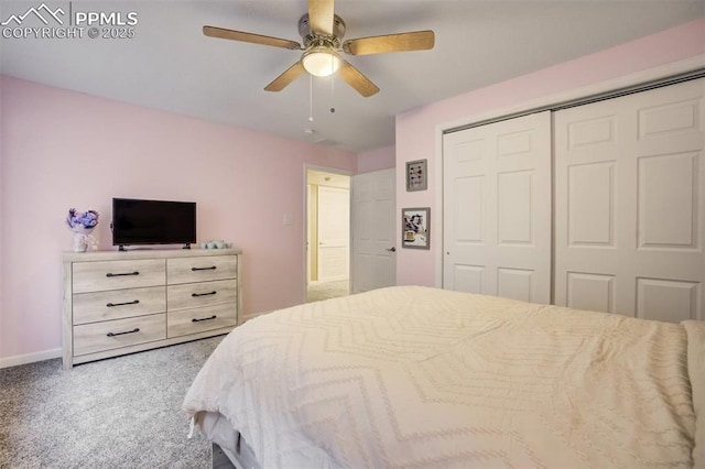 carpeted bedroom with baseboards, a ceiling fan, and a closet