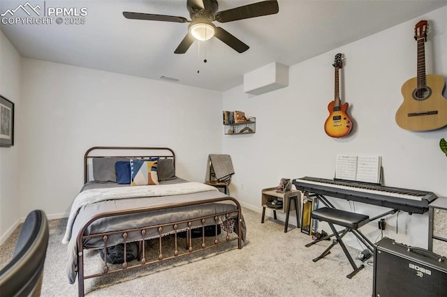 bedroom featuring visible vents, a ceiling fan, baseboards, and carpet floors