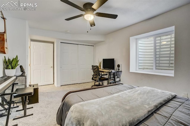 bedroom featuring a ceiling fan, carpet flooring, and a closet