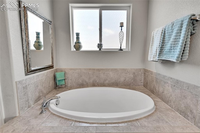 bathroom featuring a bath