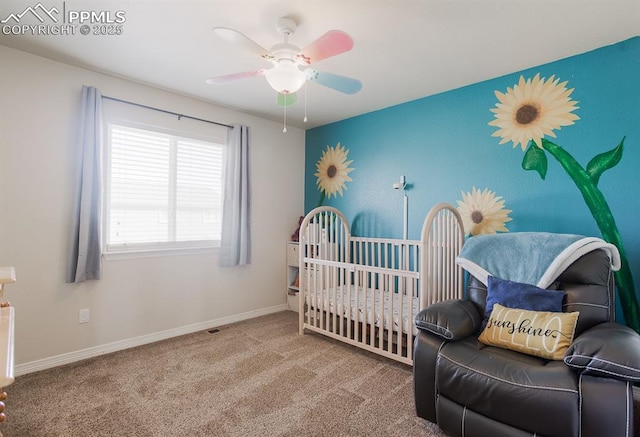 6117 Hayfield Pl, Colorado Springs, CO 80925 - carpeted bedroom featuring ceiling fan, baseboards, and a nursery area