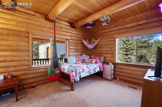 876 Obsidian Dr, Florissant, CO 80816 - bedroom featuring log walls, wooden ceiling, beam ceiling, and carpet