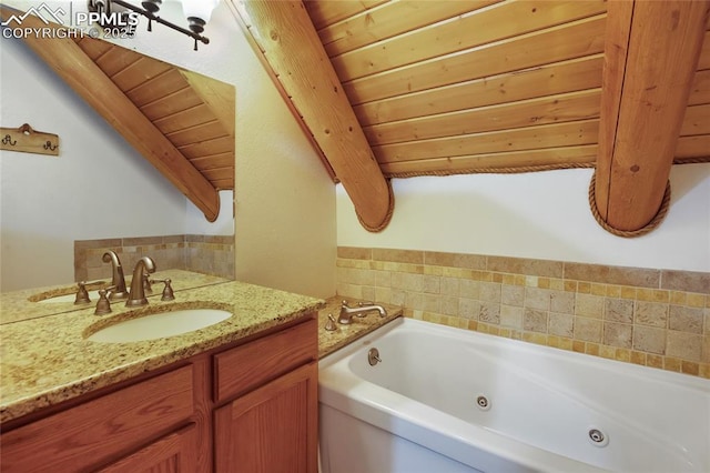 876 Obsidian Dr, Florissant, CO 80816 - bathroom featuring a tub with jets, tasteful backsplash, and vanity