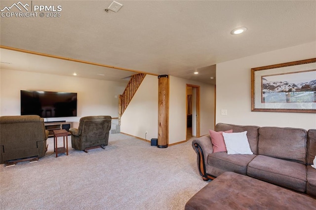 876 Obsidian Dr, Florissant, CO 80816 - carpeted living area with recessed lighting, baseboards, and stairway