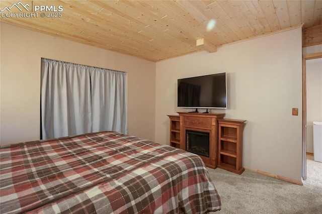 876 Obsidian Dr, Florissant, CO 80816 - bedroom with carpet floors and wooden ceiling