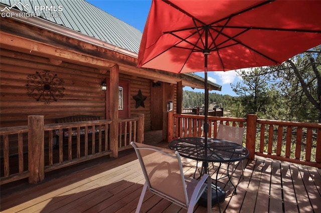876 Obsidian Dr, Florissant, CO 80816 - deck featuring outdoor dining area