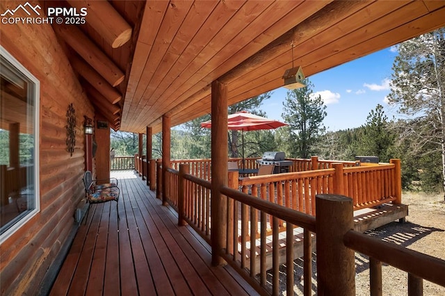 876 Obsidian Dr, Florissant, CO 80816 - wooden terrace featuring grilling area