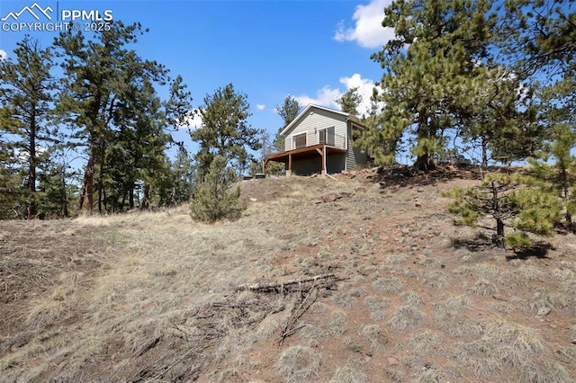 616 Moffat Dr, Cripple Creek, CO 80813 - view of yard featuring a deck