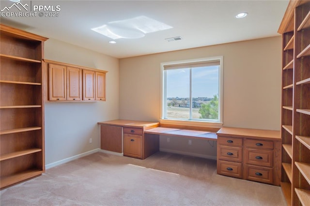 1474 Promontory Bluff Vw, Colorado Springs, CO 80921 - unfurnished office featuring baseboards, light carpet, recessed lighting, and built in desk