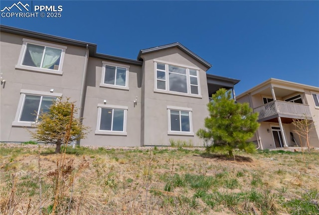 1474 Promontory Bluff Vw, Colorado Springs, CO 80921 - back of house featuring stucco siding