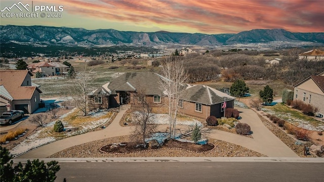 15090 Jessie Dr, Colorado Springs, CO 80921 - aerial view at dusk of a mountain view