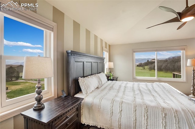 15090 Jessie Dr, Colorado Springs, CO 80921 - bedroom with wallpapered walls and a ceiling fan