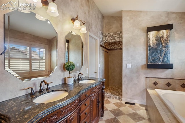 15090 Jessie Dr, Colorado Springs, CO 80921 - full bathroom featuring a bath, tiled shower, double vanity, and tile patterned flooring
