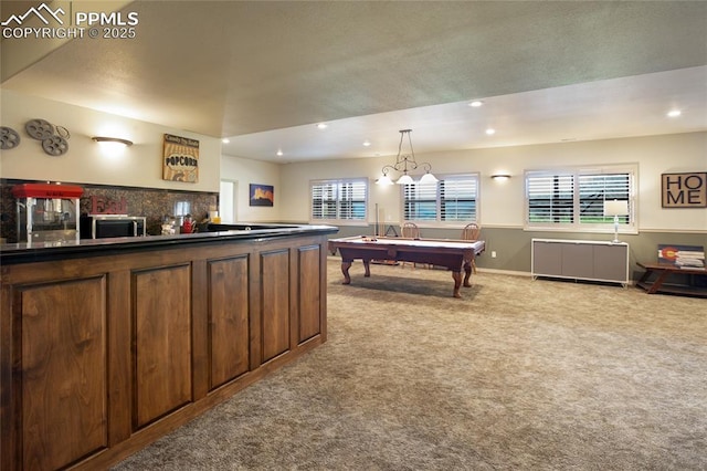 15090 Jessie Dr, Colorado Springs, CO 80921 - rec room with carpet, recessed lighting, plenty of natural light, bar, and baseboards