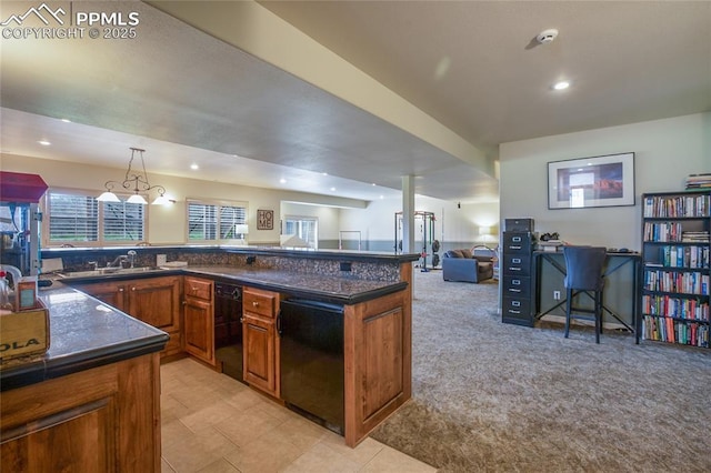 15090 Jessie Dr, Colorado Springs, CO 80921 - kitchen featuring dark countertops, open floor plan, brown cabinets, recessed lighting, and light carpet