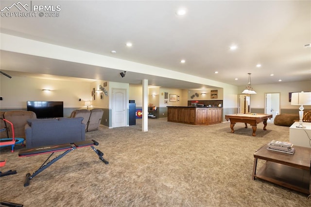 15090 Jessie Dr, Colorado Springs, CO 80921 - living room with wet bar, light carpet, billiards table, and recessed lighting
