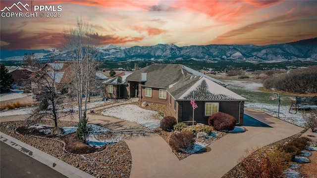 15090 Jessie Dr, Colorado Springs, CO 80921 - aerial view at dusk of a mountain view