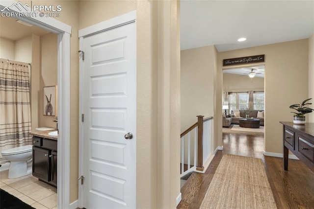 1185 Antrim Loop, Colorado Springs, CO 80910 - hallway with baseboards, light wood-type flooring, and recessed lighting