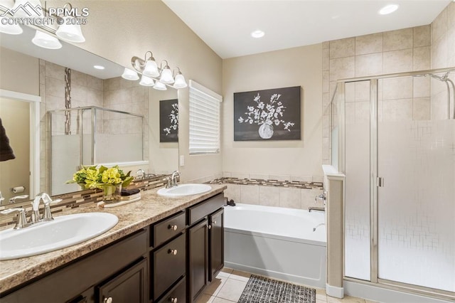 1185 Antrim Loop, Colorado Springs, CO 80910 - full bath with tile patterned floors, a garden tub, a sink, and a stall shower