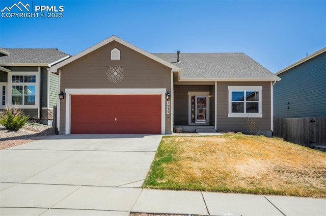 7935 Morning Dew Rd, Colorado Springs, CO 80908 - single story home featuring a garage, a front yard, driveway, and fence