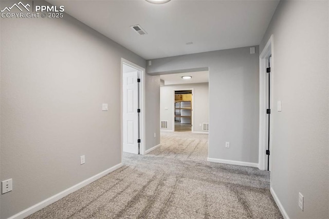 7935 Morning Dew Rd, Colorado Springs, CO 80908 - carpeted empty room with visible vents and baseboards
