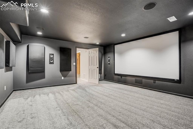 7935 Morning Dew Rd, Colorado Springs, CO 80908 - carpeted cinema room featuring a textured ceiling, baseboards, and recessed lighting