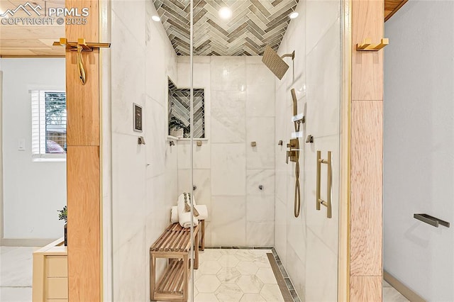 full bath featuring a shower stall