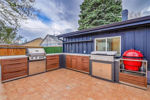 view of patio with grilling area and area for grilling