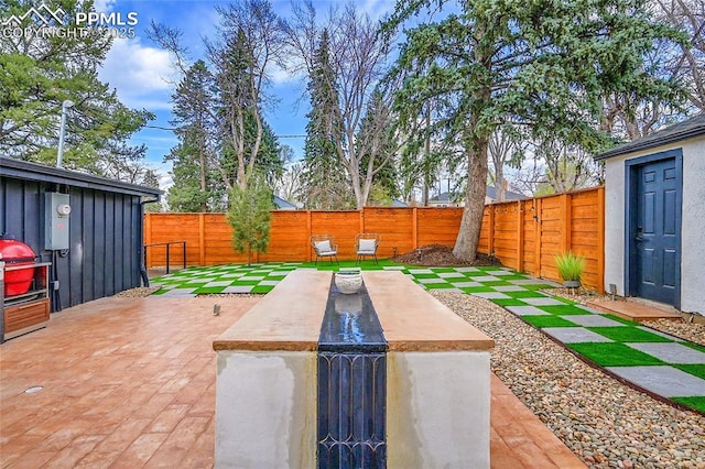 view of patio featuring a fenced backyard