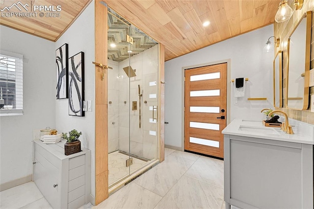 bathroom featuring a shower stall, vanity, marble finish floor, and wood ceiling