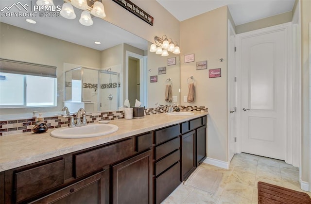 9825 Golf Crest Dr, Peyton, CO 80831 - bathroom featuring a sink, a stall shower, and decorative backsplash