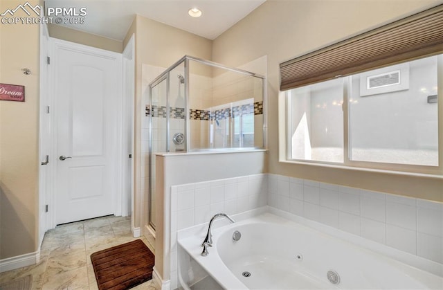 9825 Golf Crest Dr, Peyton, CO 80831 - full bath featuring a jetted tub and a stall shower