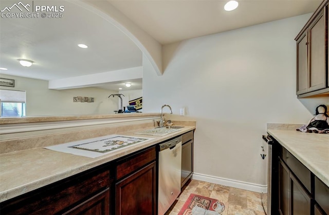 9825 Golf Crest Dr, Peyton, CO 80831 - kitchen featuring dishwasher, light countertops, a sink, cooktop, and baseboards