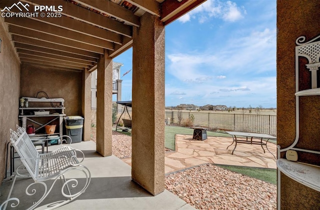 9825 Golf Crest Dr, Peyton, CO 80831 - view of patio / terrace with fence