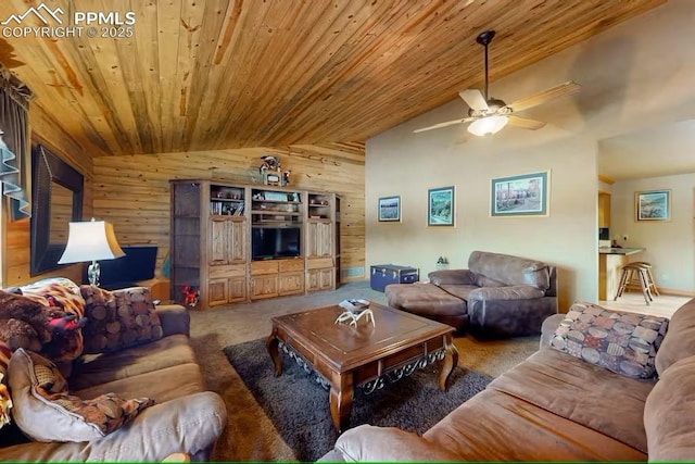 carpeted living room with wood walls, wood ceiling, a ceiling fan, and lofted ceiling