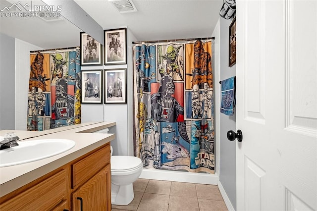 bathroom with vanity, tile patterned flooring, visible vents, toilet, and a shower with shower curtain