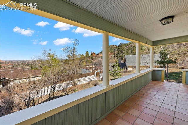 view of patio featuring fence