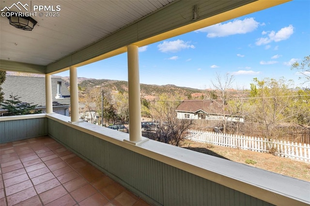 balcony featuring a mountain view