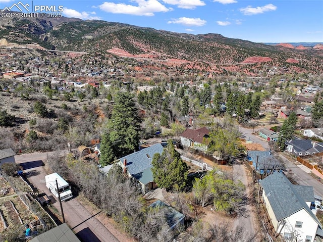drone / aerial view with a residential view and a mountain view