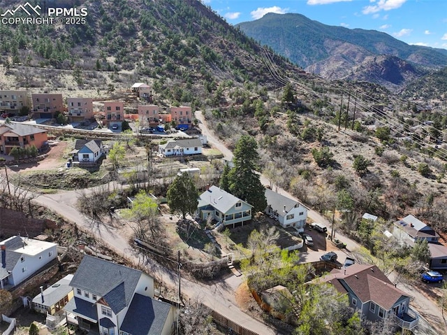 birds eye view of property featuring a residential view and a mountain view